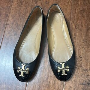 Great Tory Burch classic black flat. Size 9. Worn a handful of times.